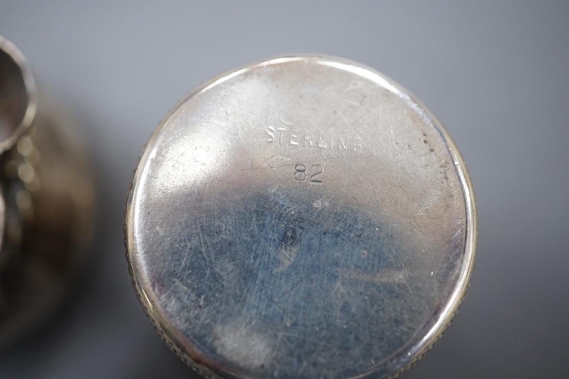 A George V silver Mappin and Webb match box holder ashtray, 12.6cm, a just a thimbleful sterling spirit tit, novelty 925 salt, modelled as a sack.